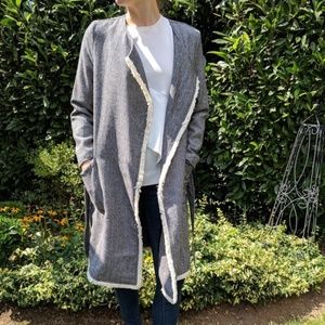 Black wrap jacket & cream fringe.  M.  Line + Dot